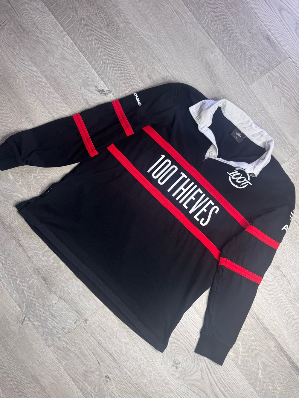 Men’s 100 Thieves Black & Red Long Sleeve Rugby Pullover